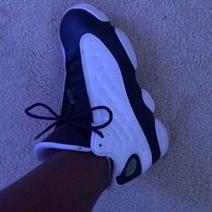 Red black and white jordan 13